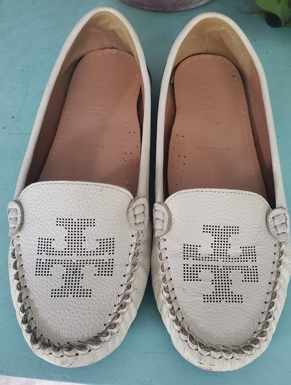 T Embossed White Leather Slip-On Loafers